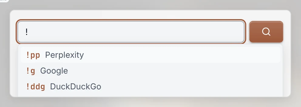 The search widget with an exclamation mark typed, showing an autocomplete popover listing bang codes: !pp Perplexity, !g Google, !ddg DuckDuckGo